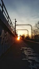 Silhouette of bridge against sky during sunset