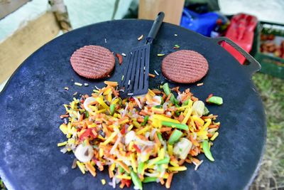 High angle view of vegetables in plate on table