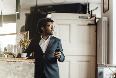 Young man looking at camera