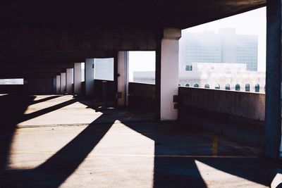 Empty corridor of building in city