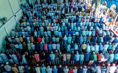 High angle view of people walking on street