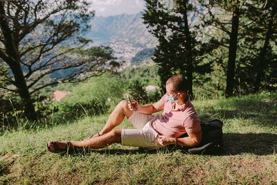 People relaxing on field