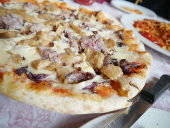 Close-up of pizza served in plate