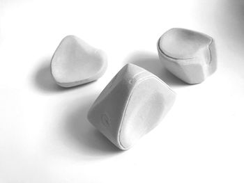 High angle view of glasses on white background