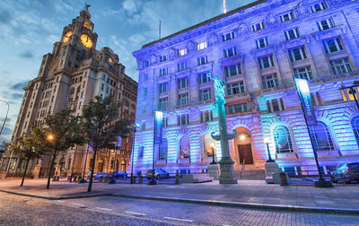 Illuminated buildings in city at night