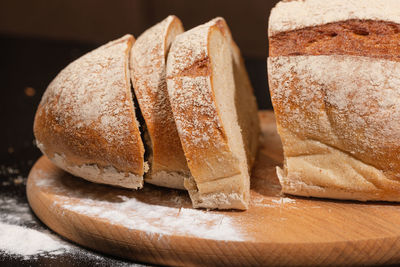 High angle view of bread on cutting board