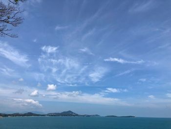 Scenic view of sea against blue sky
