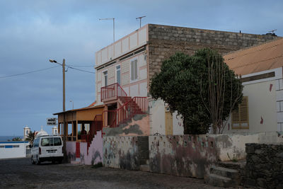 View of street and buildings against sky