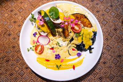 High angle view of breakfast served on table