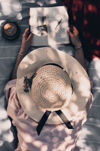 High angle view of hand holding drink