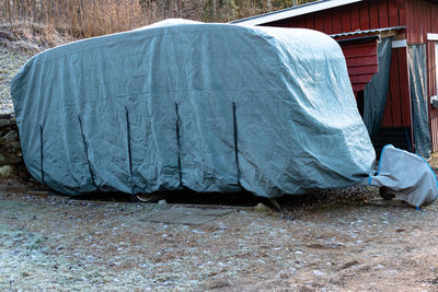 Clothes drying on white surface level of tent