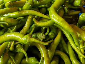 Full frame shot of green chili peppers for sale