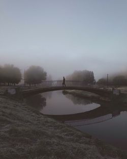 View of bridge over river against sky