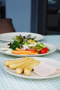 Close-up of salad served in plate on table