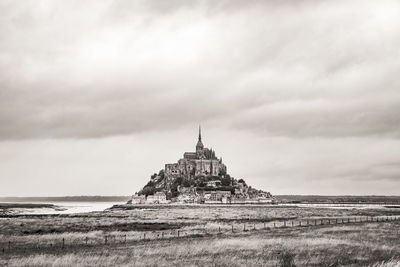 Mont saint-michel against cloudy sky