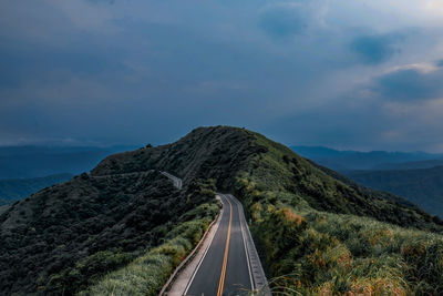Panoramic view of road on mountain against sky