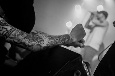 Close-up of man hands with tattoo