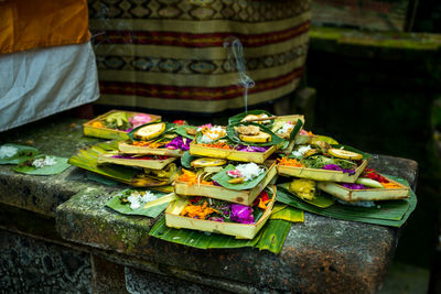 Close-up of religious offering in temple