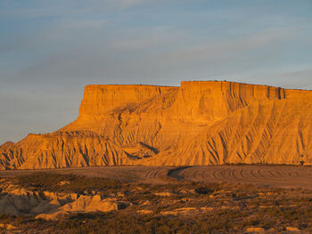 Scenic view of desert against sky