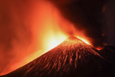 Etna great lava explosion detai view of top active crater in the night