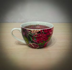 Close-up of tea cup on table