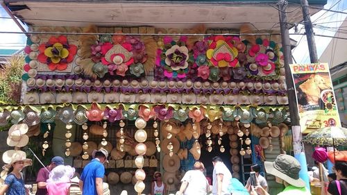 Group of people at market stall