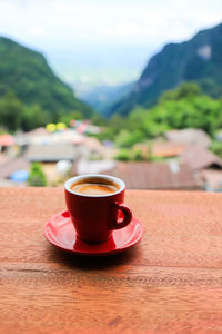 Close-up of coffee cup on table