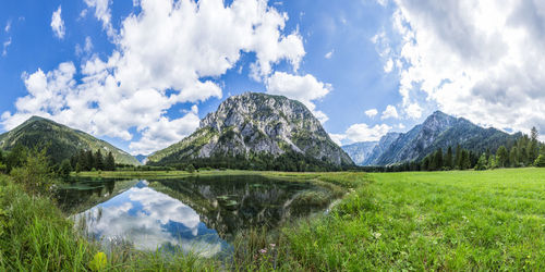 Panoramic view of lake and mountains against sky