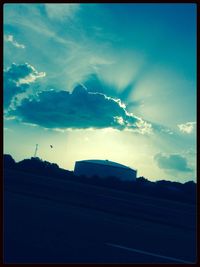 Road against cloudy sky