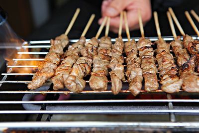 Close-up of meat on barbecue grill