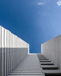 Low angle view of building against clear blue sky