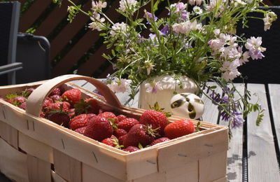 View of red strawberries in basket