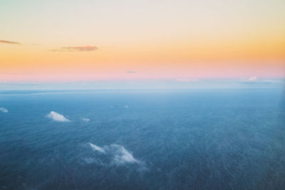 Scenic view of sea against sky at sunset