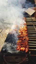 Close-up of meat on barbecue grill