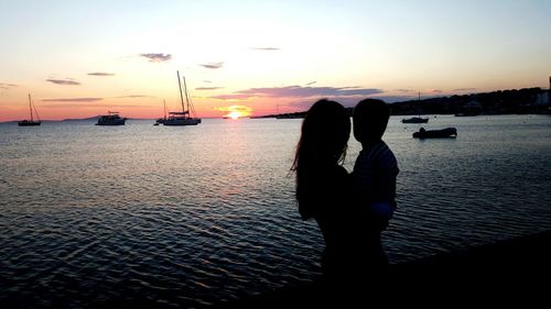 Scenic view of sea at sunset