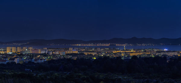 View of illuminated cityscape at night