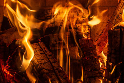 Close-up of fire burning at night