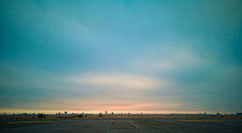 Road against sky at sunset