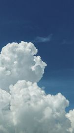 Low angle view of clouds in blue sky