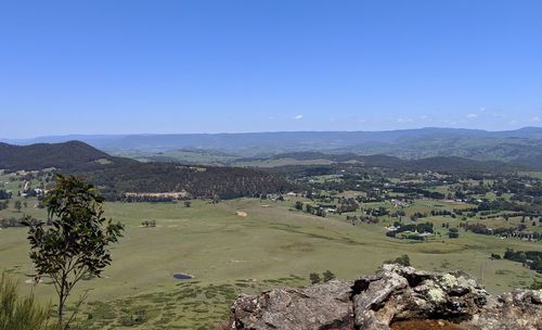 Scenic view of landscape against clear blue sky