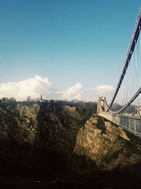 View of bridge against cloudy sky