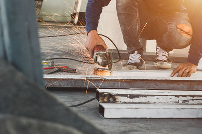 Man working on metal structure