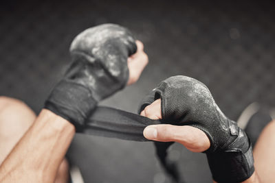 Low section of woman exercising in gym