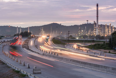 High angle view of light trails on road in city