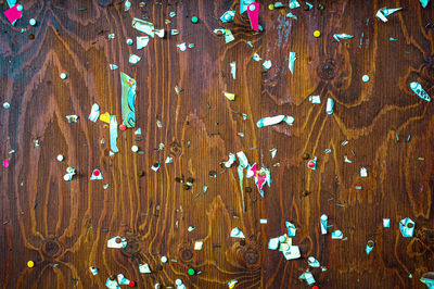 High angle view of decorations on wooden table