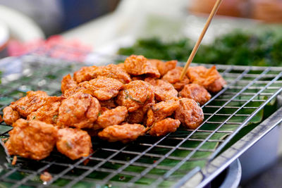 High angle view of meat on barbecue grill