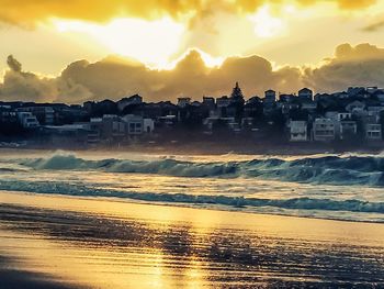 Scenic view of sea at sunset