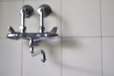 Close-up of water dripping from faucet