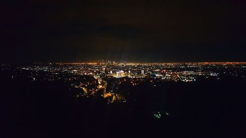 Aerial view of illuminated cityscape