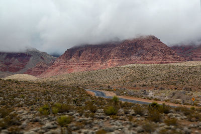 Scenic view of land against sky